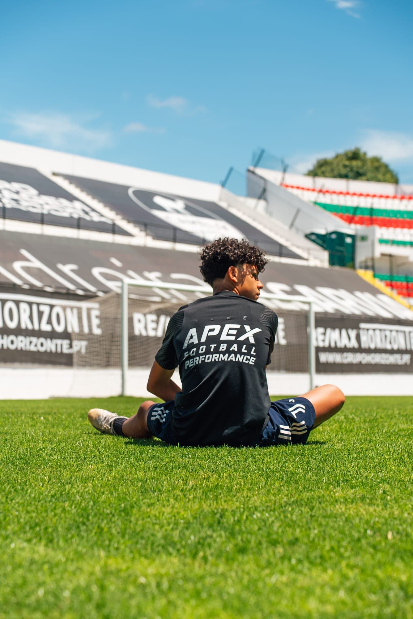 Footballer training on field at Apex Football Performance